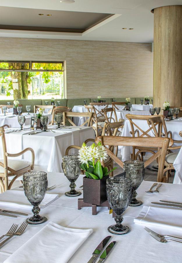Hotel Estelar Altamira Ibagué Buitenkant foto The interior of the restaurant