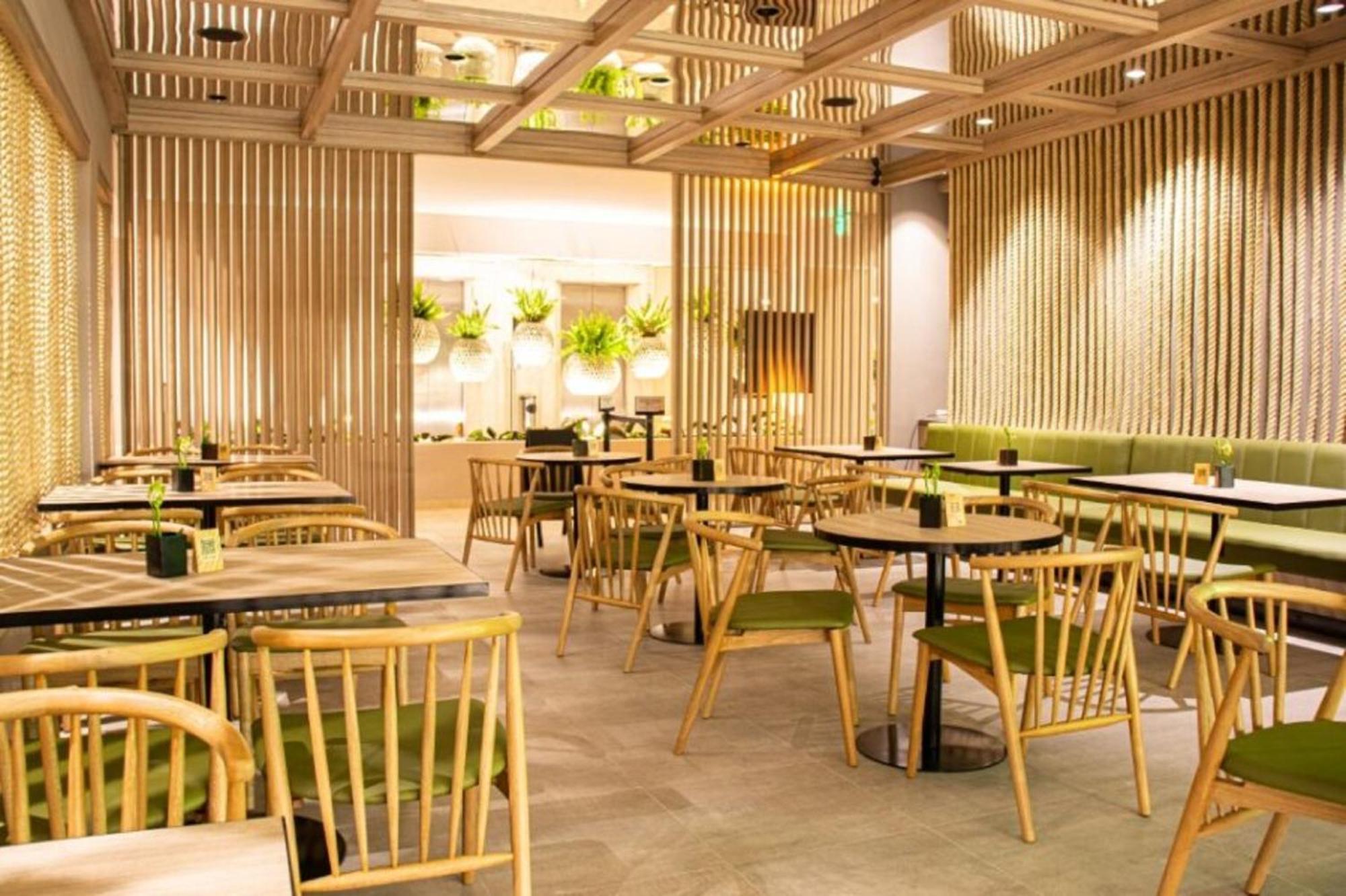 Hotel Estelar Altamira Ibagué Buitenkant foto Interior of a restaurant in Japan