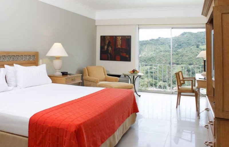 Hotel Estelar Altamira Ibagué Buitenkant foto A room at the hotel